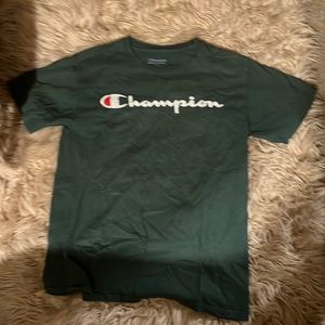 Dark green champion shirt lightly worn comfortable and authentic athletic wear